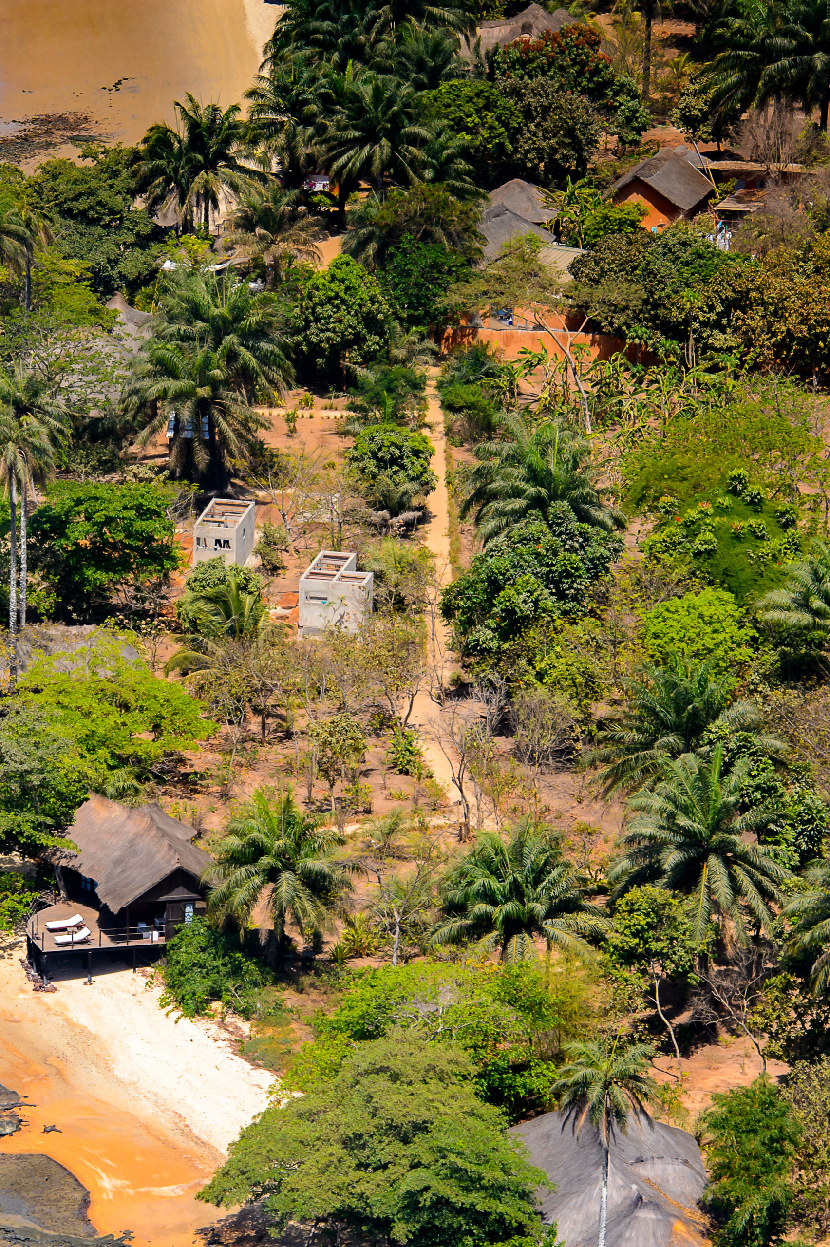 Aerial view of the beatiful blue ocean water and green trees, Bissagos Archipelago (Bijagos), Guinea Bissau. UNESCO Biosphere Reserve
